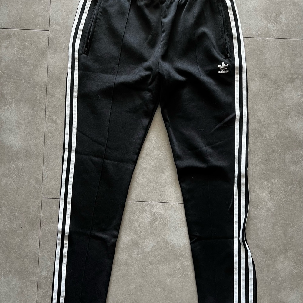 Adidas Black Sweatpants with Iconic Stripes